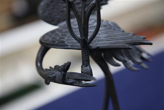 A pair of Japanese crane candelabra, late 19th century, 31.5cm., repairs